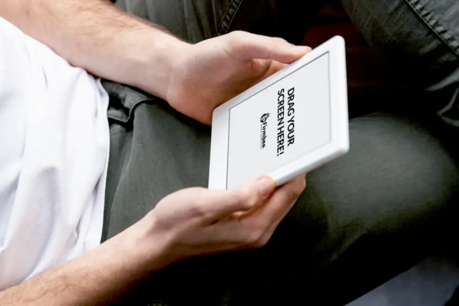 Man is reading on the Kindle - free mockup - 